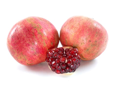 pomegranate and its part. Isolated on a white background.