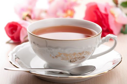 cup of tea and roses