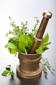 copper mortar with herbs