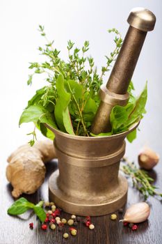 mortar with herbs and spices