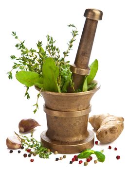 mortar with herbs isolated