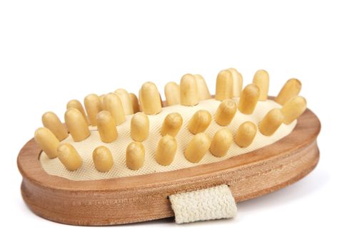 wooden massage brush isolated