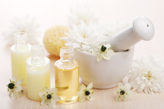 flower essential oil and mortar 