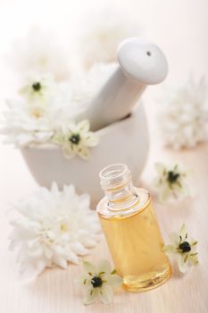 flower essential oil and mortar