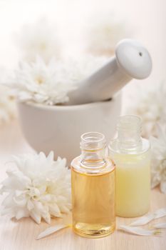 flower essential oil and mortar 