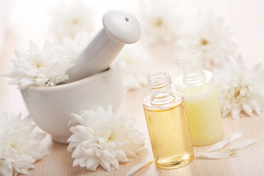 flower essential oil and mortar 
