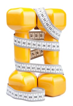 two dumbbells and measuring tape isolated 