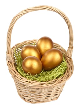 golden easter eggs in  basket isolated