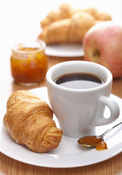 breakfast with coffee and croissant