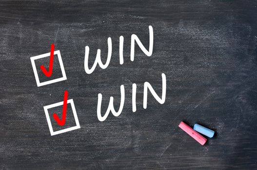 Mutual benefit or win-win concept drawn on a smudged blackboard with chalk and check boxes