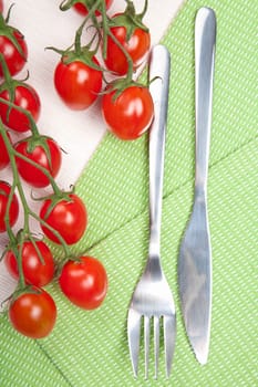 fork knife and tomatoes 