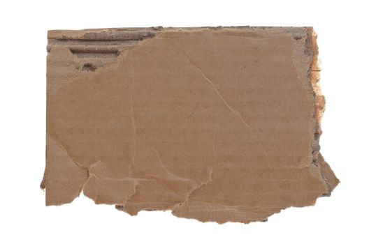 high resolution photograph of torn cardboard piece isolated over white background