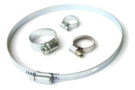 Metal clamps for construction purposes on a white