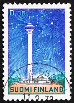 FINLAND - CIRCA 1972: a stamp printed in the Finland shows Telecommunications Tower and Stars, Polaris and Circumpolar Constellations, circa 1972