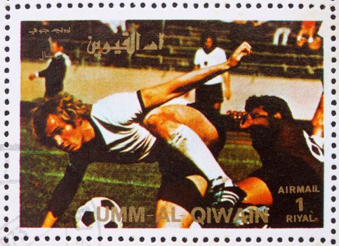 UMM AL-QUWAIN - CIRCA 1972: a stamp printed in the Umm al-Quwain shows Football, Summer Olympics, Munich 1972, circa 1972