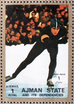 AJMAN - CIRCA 1973: a stamp printed in the Ajman shows Speed Skating, Winter Olympics, circa 1973