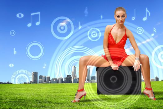 Portrait of young woman with headphones and glittering background