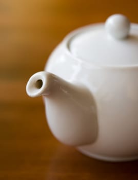 White teapot on the table