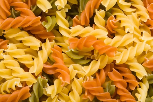 Raw italian pasta isolated on white background