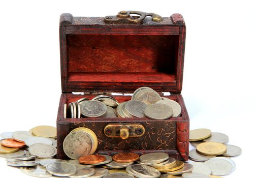 Wooden casket full of coins thai  isolated on white