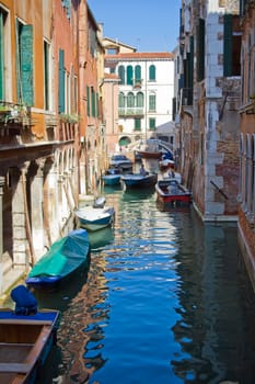 A typical canal in Venice and a bridge