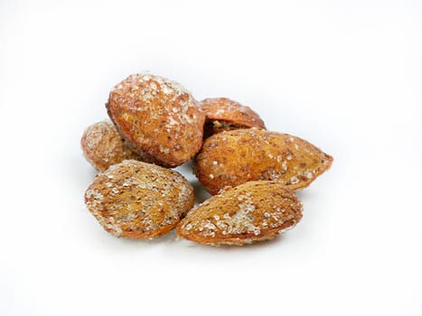 Salted shelled dried almonds isolated on a white background