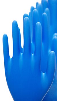 Row of blue latex gloves on white background