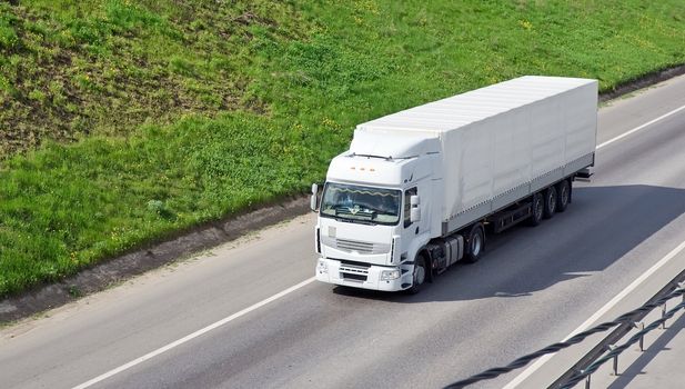White truck on a highway
