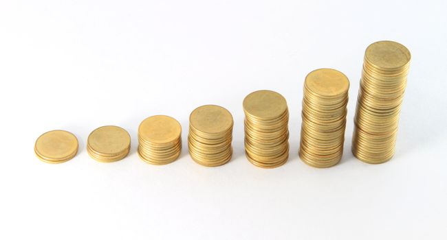 Gold coins. On a white background.