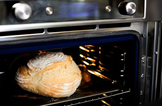 Closeup view of baked cake in the oven