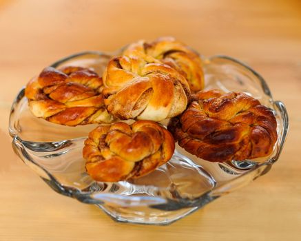 Closeup of a glass bowl containing cookies