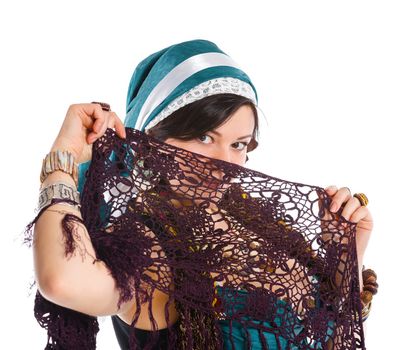 Portrait of oriental dancer in blue costume over white background