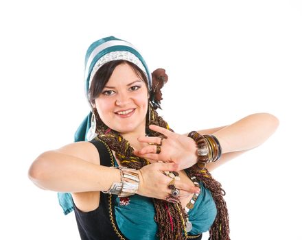 Portrait of oriental dancer in blue costume over white background