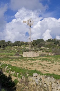Traditional water pump in the maltese countryside