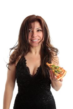 A woman holding a slice of pizza and smiling.