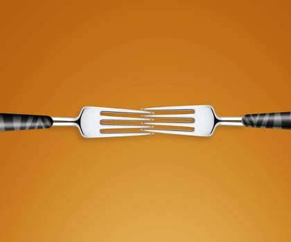 two forks on orange background