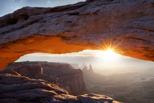 famous Mesa Arch at sunrise, near Moab city, Utah, USA