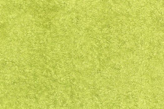 detail of a textured material from green towel