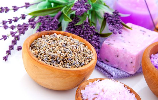 dry Lavender herbs and bath salt isolated on white background