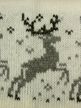 reindeer pattern woven on a scarf - detail