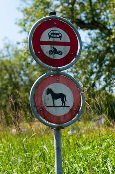No entry sign for cars, motorbikes and horses in endangered nature area