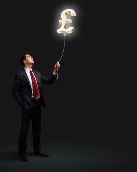 Light bulb and a business person as symbols of creativity in business