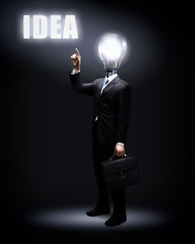 Light bulb and a business person as symbols of creativity in business