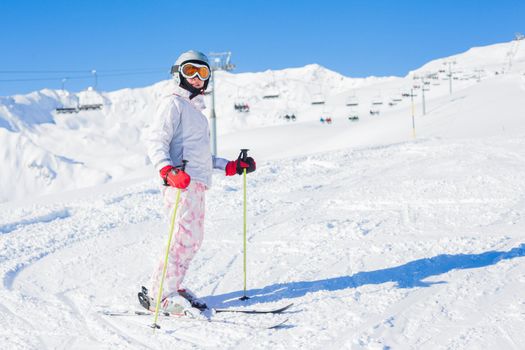 Young girl in ski outfit in the Zillertal Arena, Austria