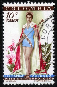 COLOMBIA - CIRCA 1959: A stamp printed in Colombia shows image of Luz Marina Zuluaga from Colombia ,  Miss Universe 1959,  circa 1959