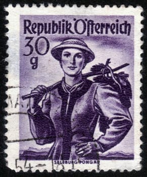 AUSTRIA - CIRCA 1950: A stamp printed in Austria shows image woman in national Austrian costumes, Salzburg, Pongau , from the series "Costumes", circa 1950