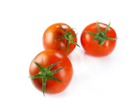 Fresh Red tomatoes isolated on white background