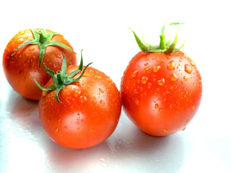 Fresh Red tomatoes isolated on white background