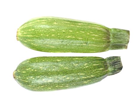 fresh zucchini fruits isolated on white background