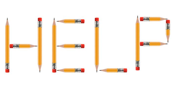 short Pencils isolated on white background arranged to spell Help.